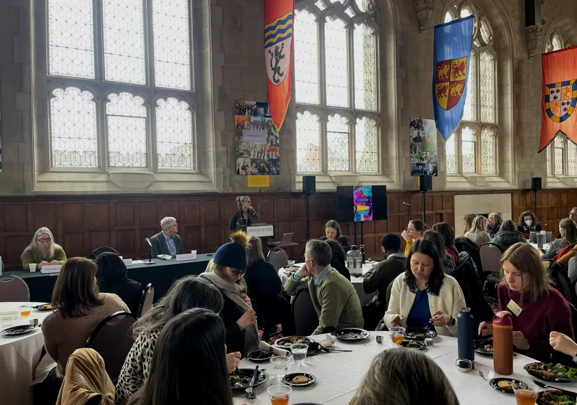 Wide shot of Great Hall filled with people attending the lecture